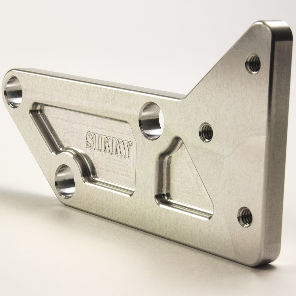 Sikky Mounts oil filter housing to AC compressor location on – LS Engine block